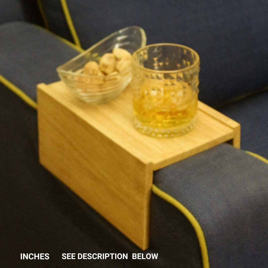 <img src="couch-caddy-arm-rest-plain.jpg" alt="Plain sofa arm tray designed for holding drinks, snacks, and other essentials while lounging.">
