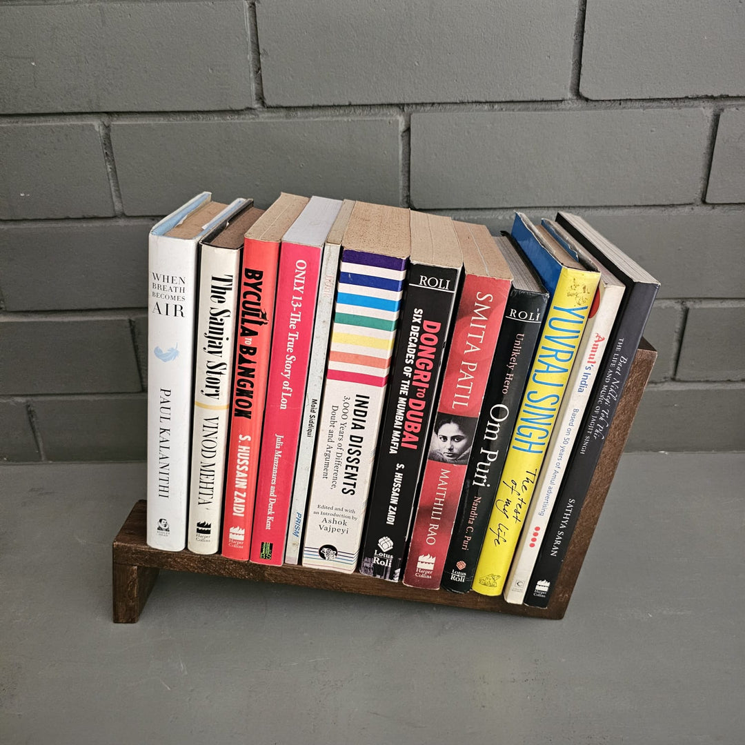 <img src="book-ends-fan-copy-1.jpg" alt="Stylish bookends in a fan shape, designed to securely hold books while adding a unique, modern touch to your bookshelf or desk. Perfect for home or office decor.">