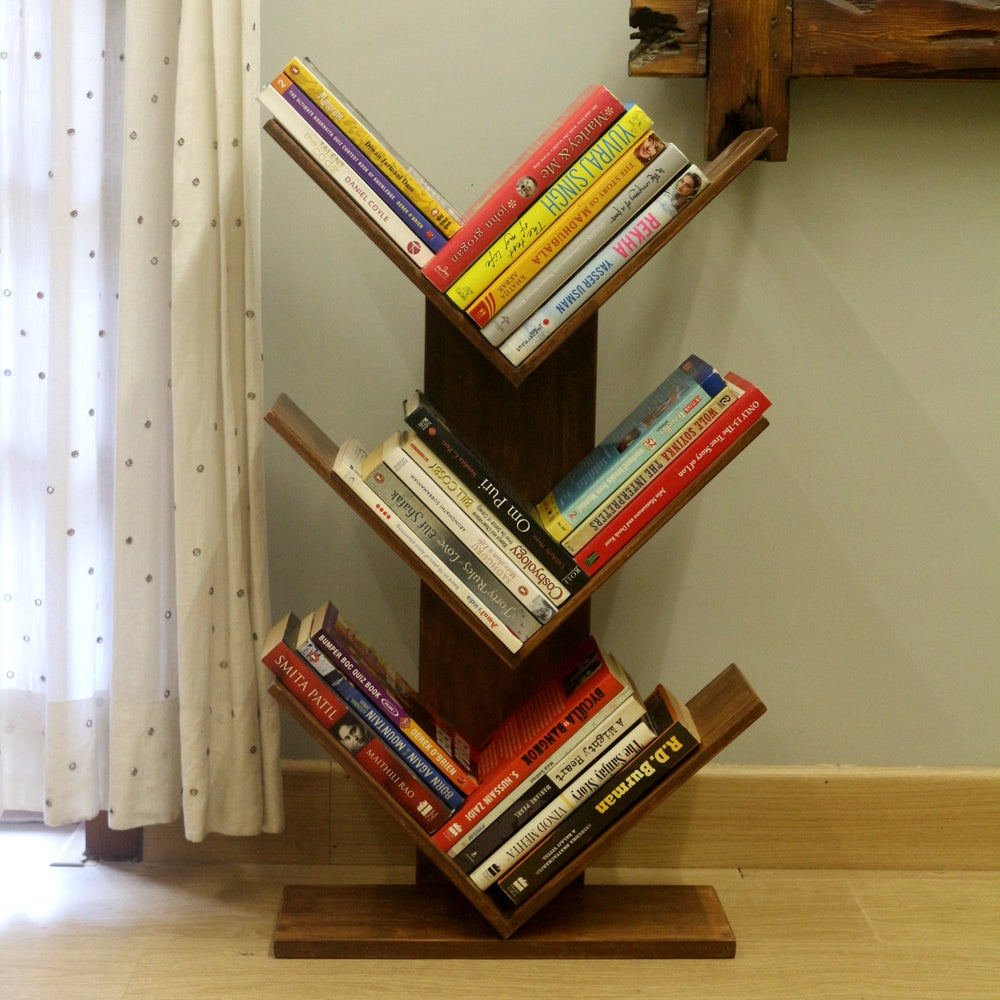 <img src="book-stand-dark-brown.jpg" alt="Dark brown wooden book stand, perfect for organizing and displaying books in style.">
