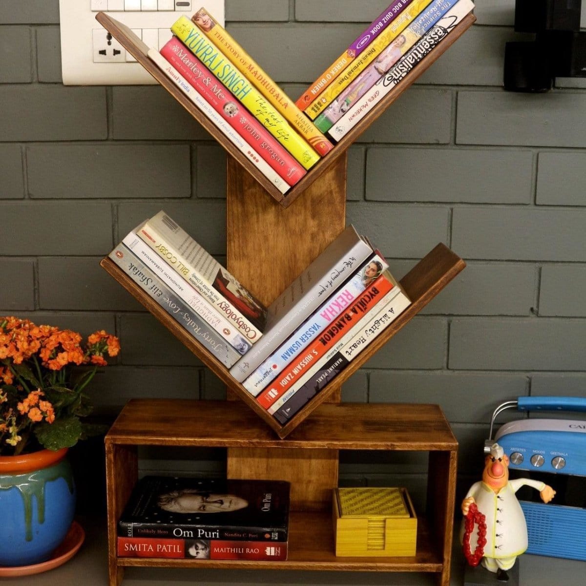 <img src="book-stand.jpg" alt="Handmade book stand with multiple shelves, perfect for organizing books in the bedroom, living room, or dining room.">
