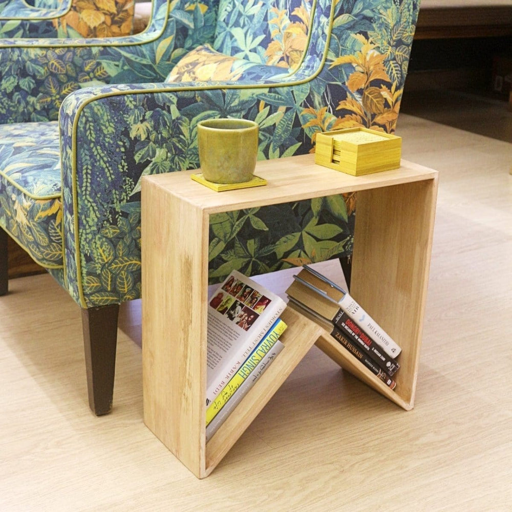 <img src="side-table-for-book-lovers.jpg" alt="Side table for book lovers, featuring a sleek design with space to store books and beverages for a cozy reading experience.">