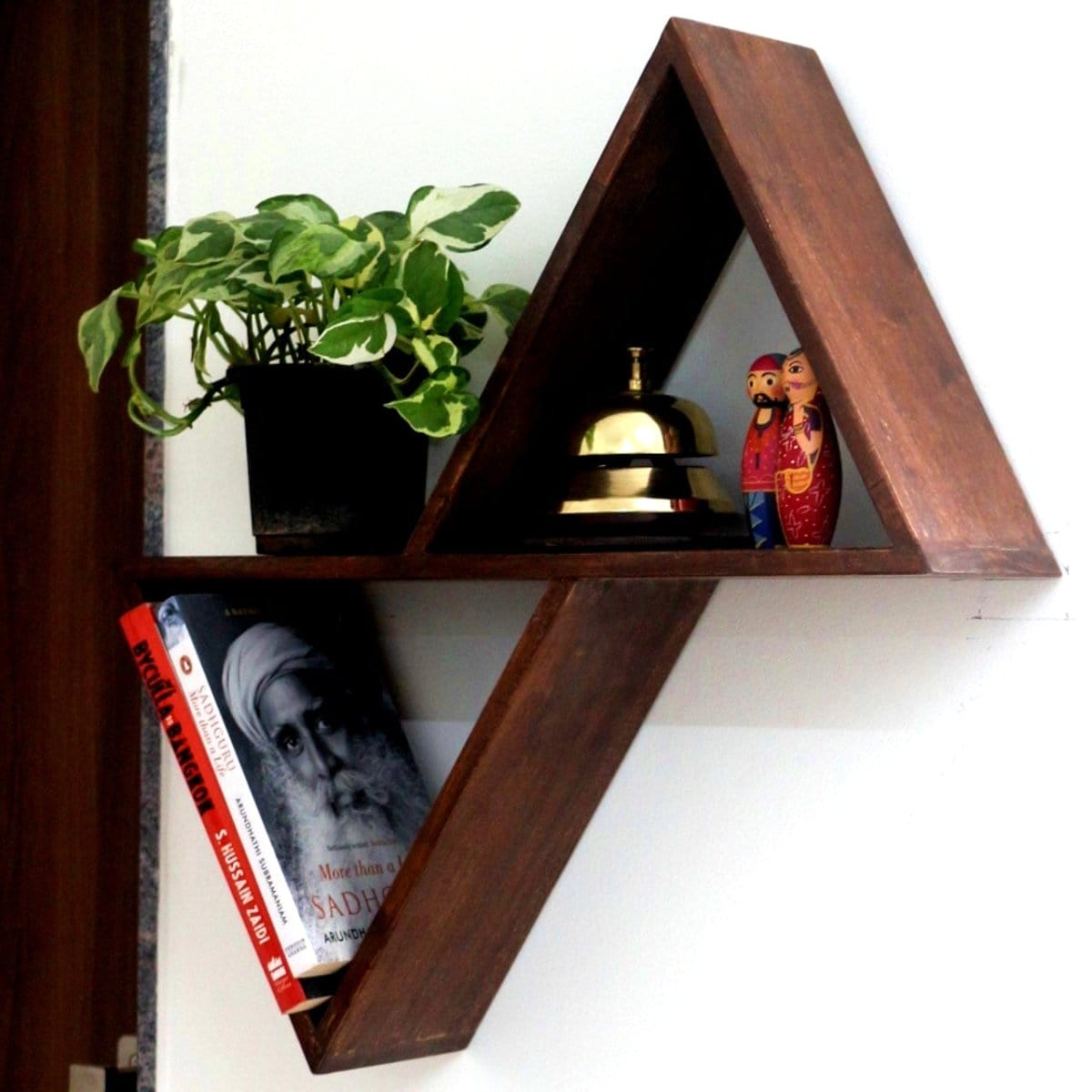 <img src="wall-shelf-triangular-a.jpg" alt="Elegant triangular wall shelf, a modern design ideal for showcasing decor items, plants, or books in any living space.">
